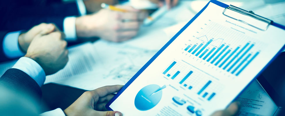 close-up-executive-holding-economic-report (1).jpg